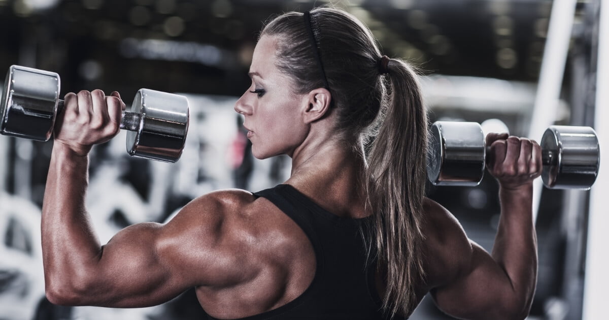 Woman showcasing her toned arms after strength training