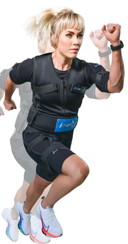 image of a woman wearing an EMS (Electro Muscle Stimulation) training suit branded 'i-motion'. She is in a dynamic pose, appearing to be in the midst of a workout or movement, with her fist raised.