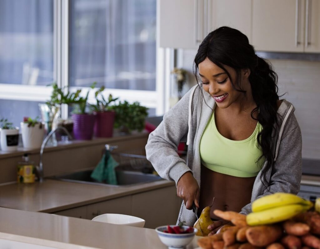 Woman preparing healthy food at home